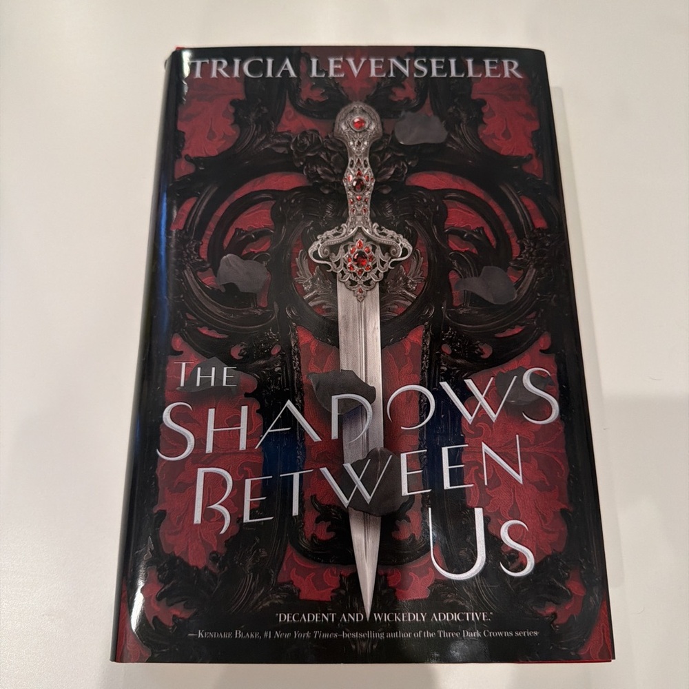 The Shadows Between Us by Tricia Levenseller - Hardcover